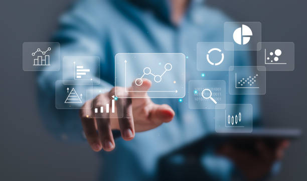 istock KPI Business analytics concept. Businessman touch virtual screen of data analytics report and key performance indicators on information dashboard for business strategy and business intelligence. 2075877100