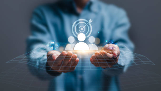istock CRM, customer relationship management, Businessman holding virtual target customer icon for customer focus group. Digital marketing online, CRM, Data exchanges development and customer service. 2075877690