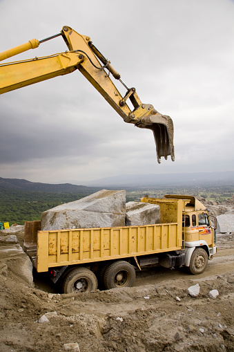 bulldozer in a marble quarry