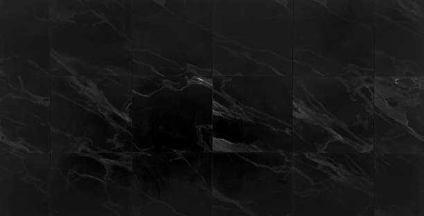 istock dark black calcutta marble wall tiles pattern for bathroom, kitchen, public space decoration. square tiles pattern. marble ceramic granite black background. smooth tile natural for interior design. 2075904836