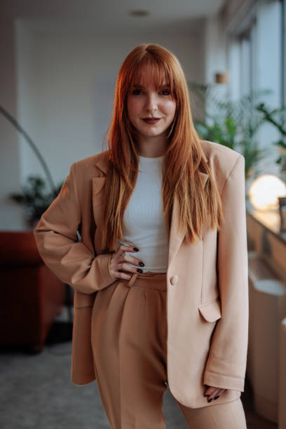 istock Redhead businesswoman posing at work 2075907572