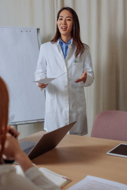 istock Female doctor doing a health importance presentation 2075908089