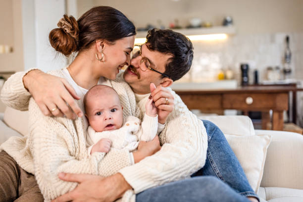 istock Happy young family at home 2075916637