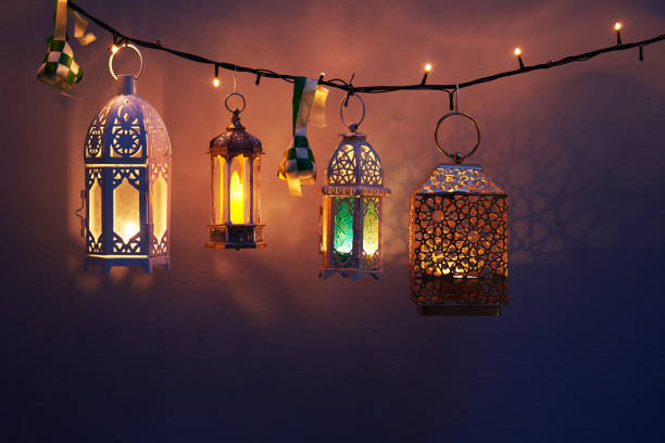 istock ribbon ketupat Arabic lantern on green and blue background 2075918209