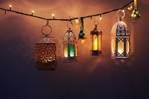 istock ribbon ketupat Arabic lantern on green and blue background 2075919272