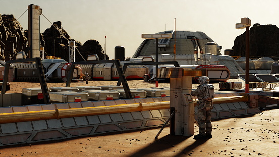 Alone astronaut stands in Mars base, surrounded by modular buildings and advanced technology. Rugged Martian terrain looms in background, highlighting isolation. 3d render