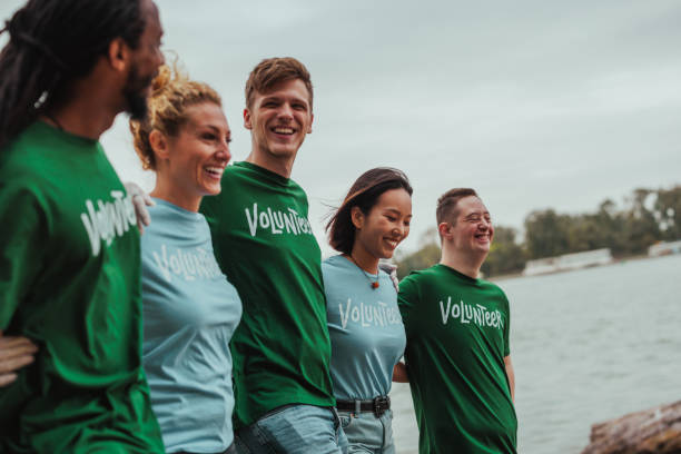 istock Multiethnic volunteer group walking and laughing 2075926648