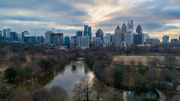Aerial panoramic view of Atlanta skyline shot from Piedmont park during sunset in the month of March 2024.