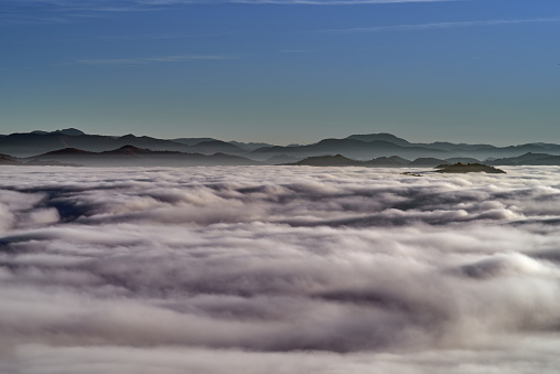 profile of the mountain on the sea of ​​ fog