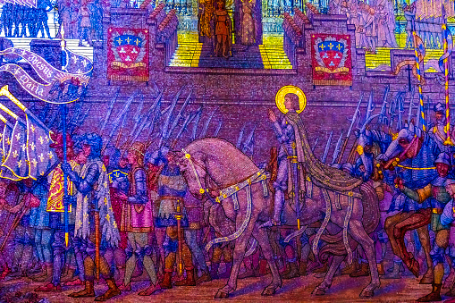 Colorful Gilded Saint Joan of Arc Mosaic Basilica of Notre Dame de Fourvière Lyon France. Joan of Arc Patron French saint fought English 1400s, Martyred in Rouen. Church built from 1872 to 1896.