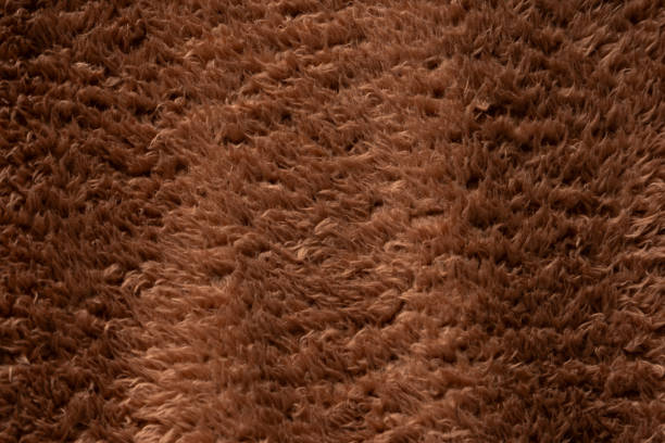 Texture of a brown faux fur as a background.