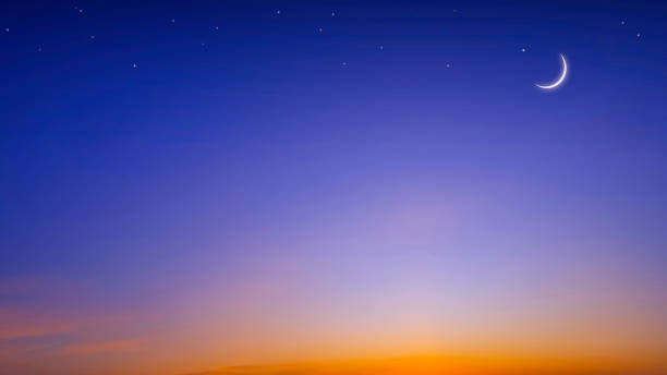 istock Crescent moon and star on colorful twilight sky, Beautiful evening horizon sky background 2076045030