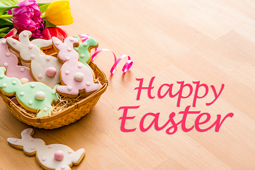 Easter Bunny cookies greeting card. High resolution 42Mp studio digital capture taken with SONY A7rII and Zeiss Batis 40mm F2.0 CF lens