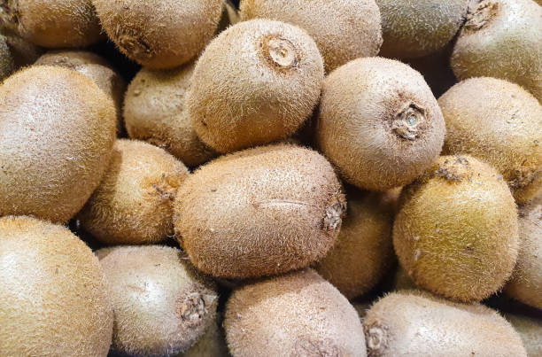 istock Kiwi in peel.. Kiwi natural fruit background. 2076127414
