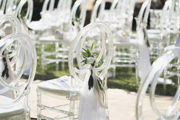 istock White transparent chairs at the wedding ceremony 2076168399