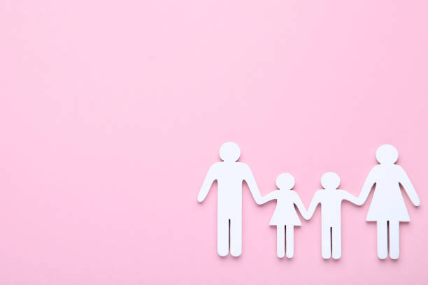 istock Family figures on pink background 2076178889