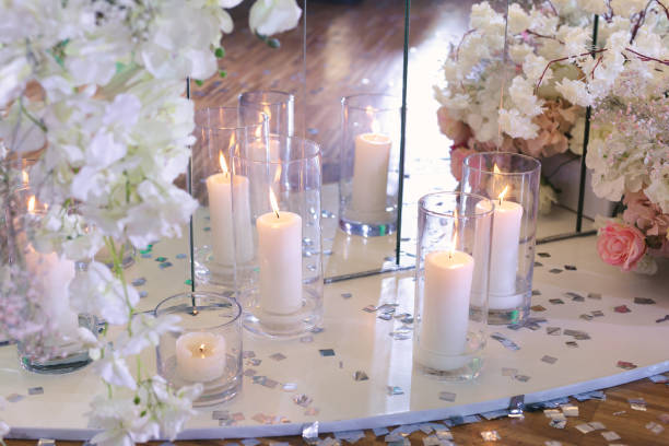 istock Wedding decor in a restaurant with candles and flowers. 2076186632