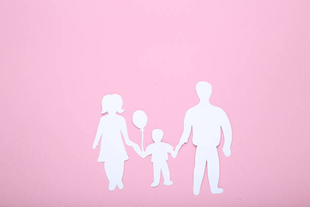 istock Family figures on pink background 2076187678