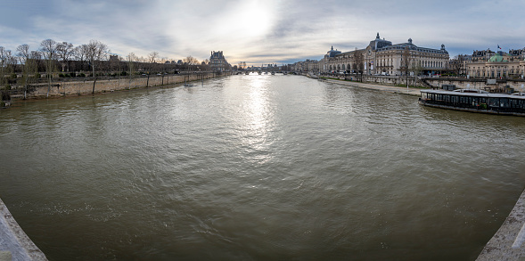 Paris, France - 03 08 2024: View of the quayside of the Seine from the Leopold-Sedar-Senghor footbridge