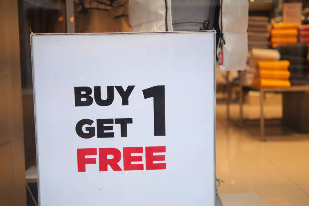 Buy one get one free label on a blur Supermarket background.