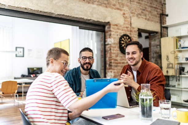 istock Young people working on a project in the modern office 2076200137