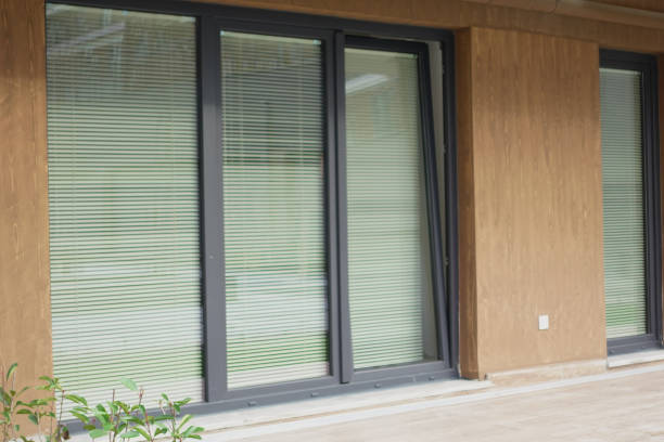 istock Modern front window with thin curtains and house walls from the outside view. 2076213194