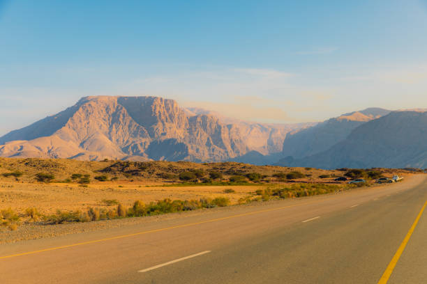 Dramatic view of beautiful mountain range and the the road in Oman, Middle East