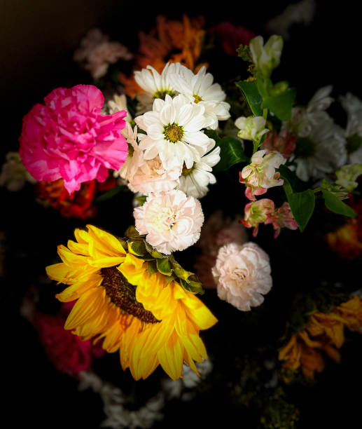 Bouquet of red roses and various flowers on a white background;