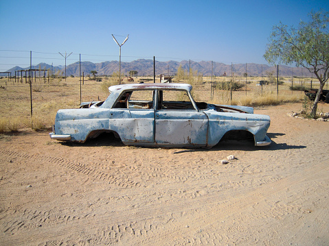 Old broken car in the desert