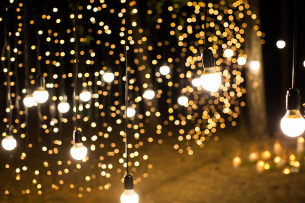 istock Wedding ceremony evening with candles and lamps in the coniferous pine forest 2076277490