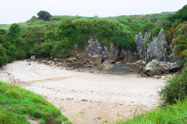Gulpiyuri beach on a rainy day. Asturias, Spain