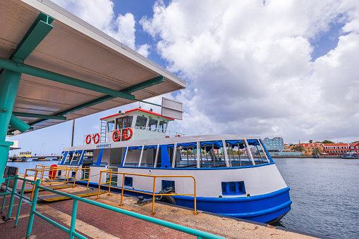 Willemstad. Curacao. 03.11.2024. Сlose-up of a local cruise ferry at the Santa Anna Bay harbor, providing scenic tours to explore the landmarks of the area.