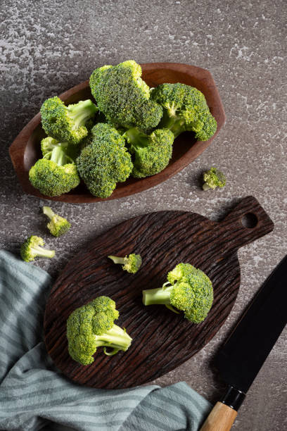 istock Fresh green organic broccoli on the table. 2076341458
