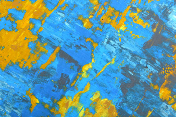 abstract art background in yellow-blue tones with scratches