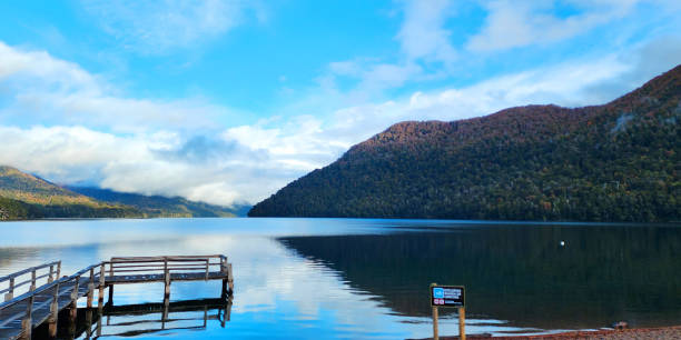 istock Bridge with a lake and mountains. 2076343584