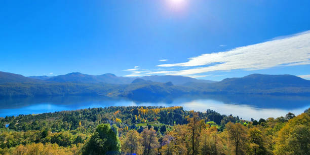 istock View from the top with mountains and trees on a sunny day 2076352564