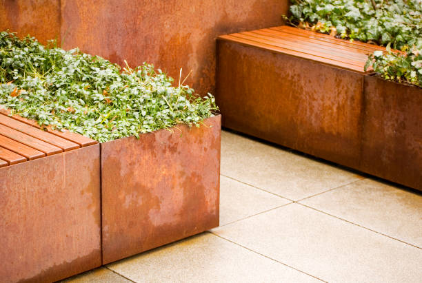 istock Green plants in corten flower pot close up. 2076366823