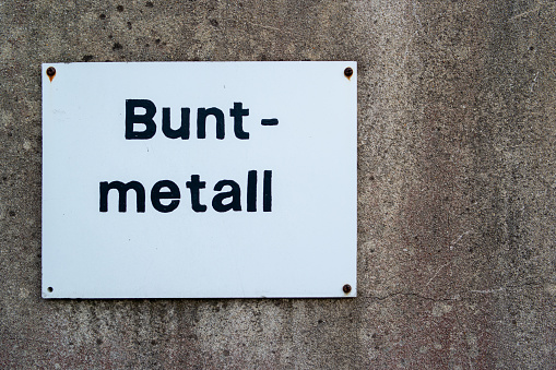 Sign for non-ferrous metal in the recycling center in german