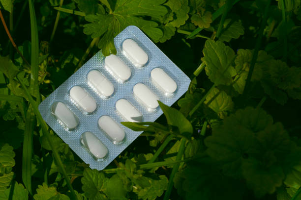 a small round mass of solid medicine to be swallowed whole