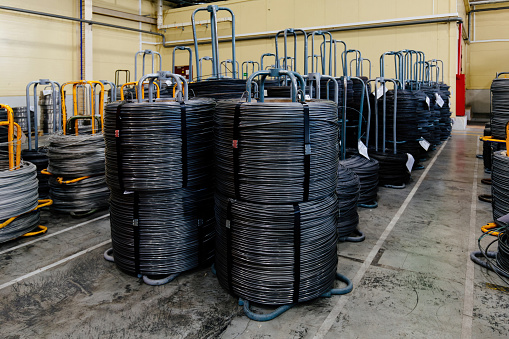 Steel wire coil in metalworking factory.