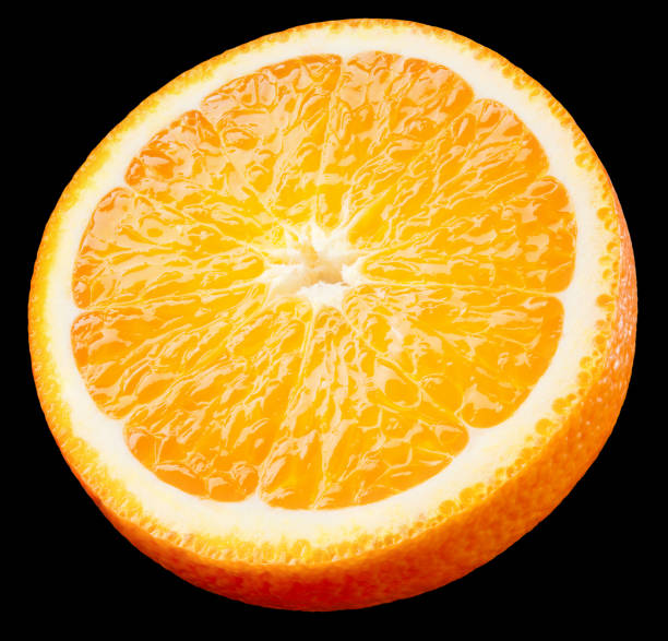 Orange slice isolated. Round orange slice on black background. Orang fruit circle piece with clipping path. Isolated black. Full depth of field.