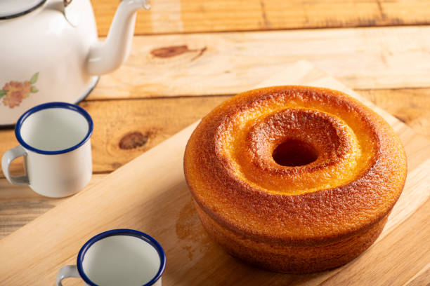 istock Orange cake, beautiful orange cake and accessories on rustic wooden surface, dark background, selective focus. 2076508823