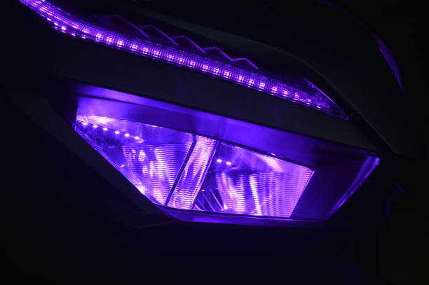 istock The front LED light of a purple automatic motorbike 2076618095