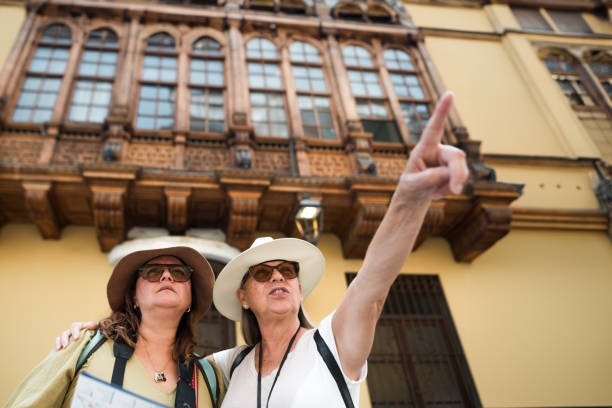 istock Tourist pointing to a place with his hand. 2076717546