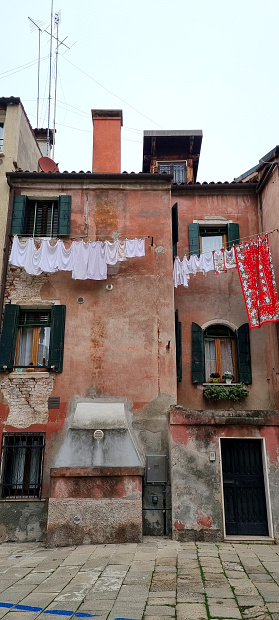 It gives a lot of charm to these old buildings having some clothes hanging outside to dry out.