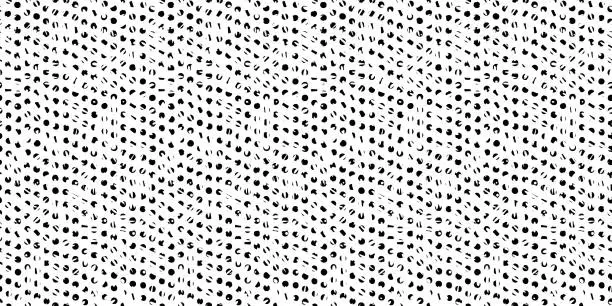 Vector illustration of Black white geometric textured polka dot pattern