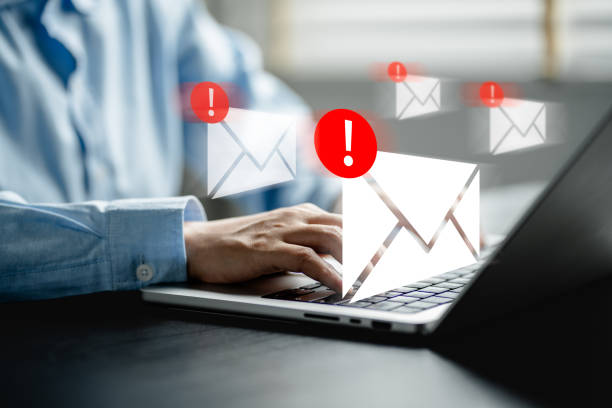 istock Businesswomen checking email via laptop have spam malware screen alerts, cyber internet web hack attacks, warning errors, sniffing attack, phishing, cybersecurity network concept 2076885489