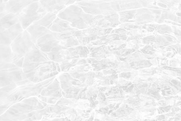 istock White water surface texture with ripples, splashes, and bubbles. Abstract summer banner background Water waves in sunlight with copy space cosmetic moisturizer micellar toner emulsion. White water. 2076905433
