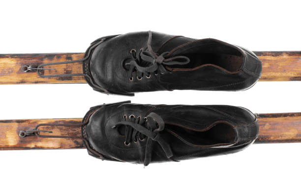 istock old black ski boots isolated on white background 2077019693