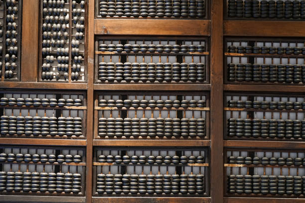 istock old Chinese abacus hanging on the wall as interior decoration 2077021448